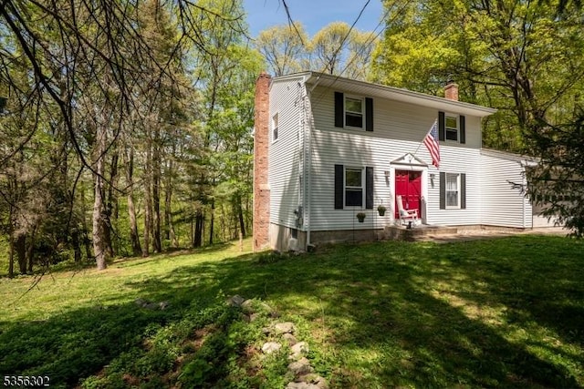 6 Longview Ln, Vernon Twp, NJ 07461 - colonial inspired home featuring a chimney and a front lawn
