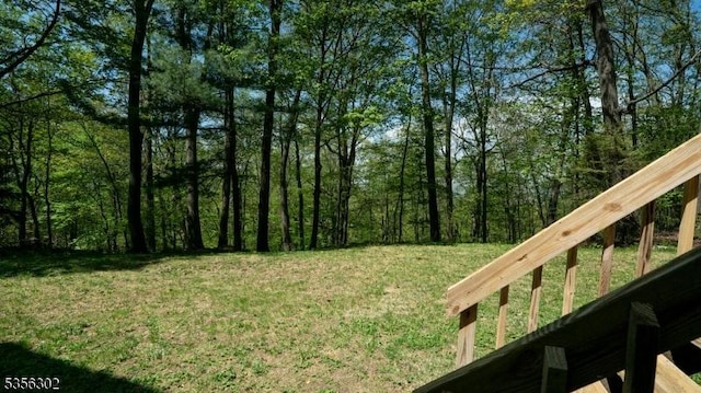 6 Longview Ln, Vernon Twp, NJ 07461 - view of grassy yard featuring a wooded view