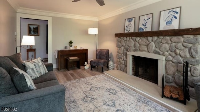 6 Longview Ln, Vernon Twp, NJ 07461 - living room with crown molding, wood finished floors, a ceiling fan, a stone fireplace, and baseboards