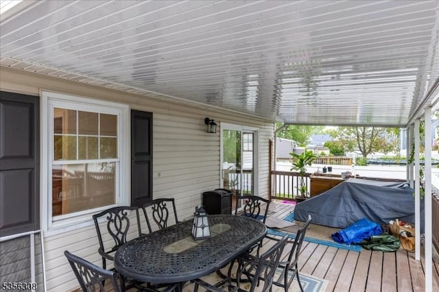 deck featuring outdoor dining space