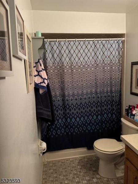 8 Le Touquet Unit 4, Vernon Twp, NJ 07462 - full bath featuring toilet, vanity, and a shower with shower curtain