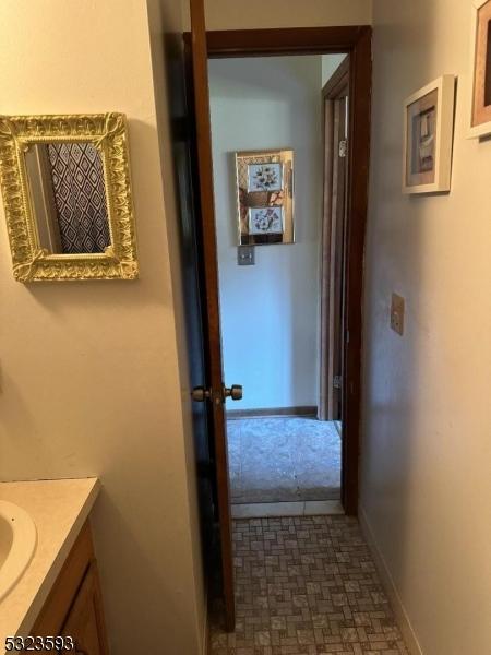8 Le Touquet Unit 4, Vernon Twp, NJ 07462 - hall with dark floors and baseboards