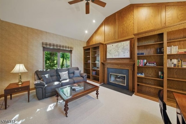 living area with a fireplace with flush hearth, light carpet, a ceiling fan, high vaulted ceiling, and recessed lighting