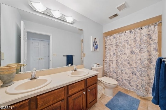 full bathroom with tile patterned flooring, double vanity, toilet, and a shower with shower curtain
