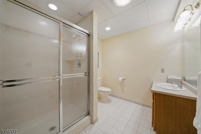 full bathroom with a stall shower, tile patterned flooring, and vanity