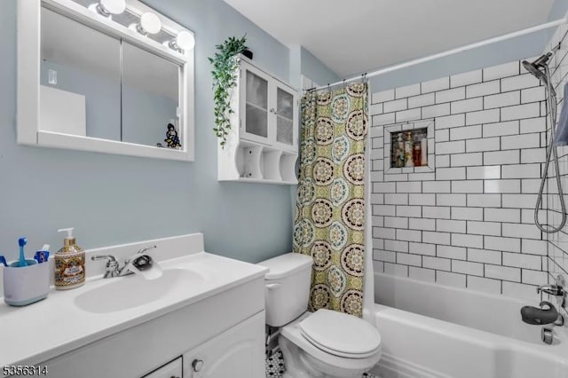bathroom with toilet, shower / bath combo with shower curtain, and vanity