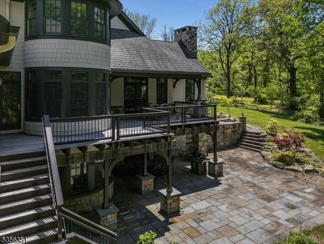 152 Whitebridge Rd, Franklin Twp, NJ 08867 - back of house with stairway, a patio area, a chimney, and a wooden deck