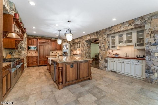 152 Whitebridge Rd, Franklin Twp, NJ 08867 - kitchen with stainless steel microwave, a sink, brown cabinetry, glass insert cabinets, and stovetop