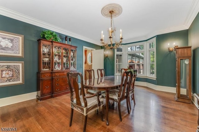 152 Whitebridge Rd, Franklin Twp, NJ 08867 - dining room with a chandelier, wood finished floors, baseboards, and crown molding