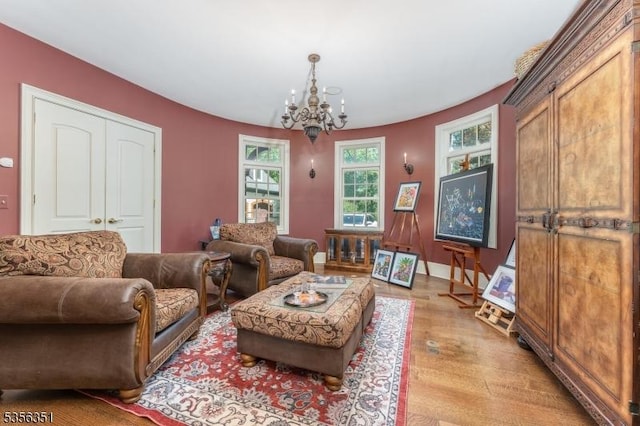 152 Whitebridge Rd, Franklin Twp, NJ 08867 - living area featuring a chandelier, light wood-style floors, and baseboards