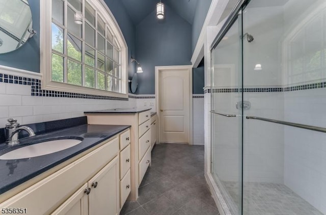 152 Whitebridge Rd, Franklin Twp, NJ 08867 - full bathroom featuring a stall shower, vanity, tile patterned floors, tile walls, and wainscoting