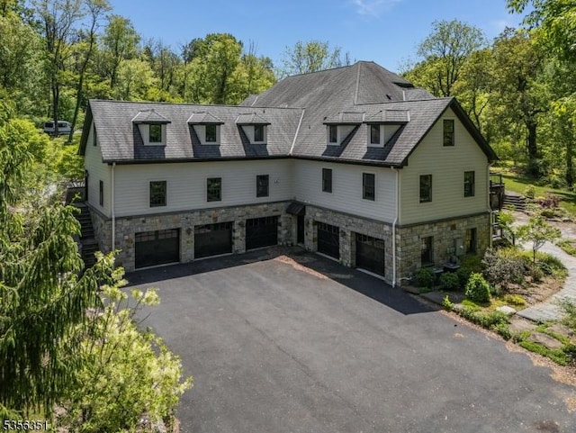 152 Whitebridge Rd, Franklin Twp, NJ 08867 - view of front of property featuring an attached garage, stone siding, and driveway