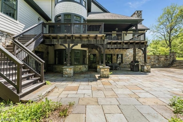 152 Whitebridge Rd, Franklin Twp, NJ 08867 - back of house featuring a patio, stairway, a chimney, stone siding, and roof with shingles