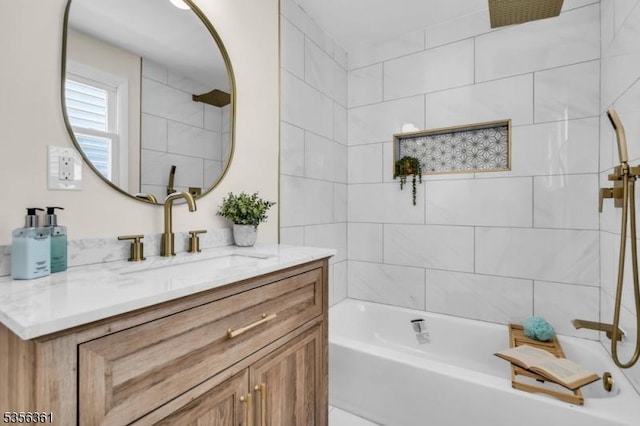 bathroom with shower / bathtub combination and vanity