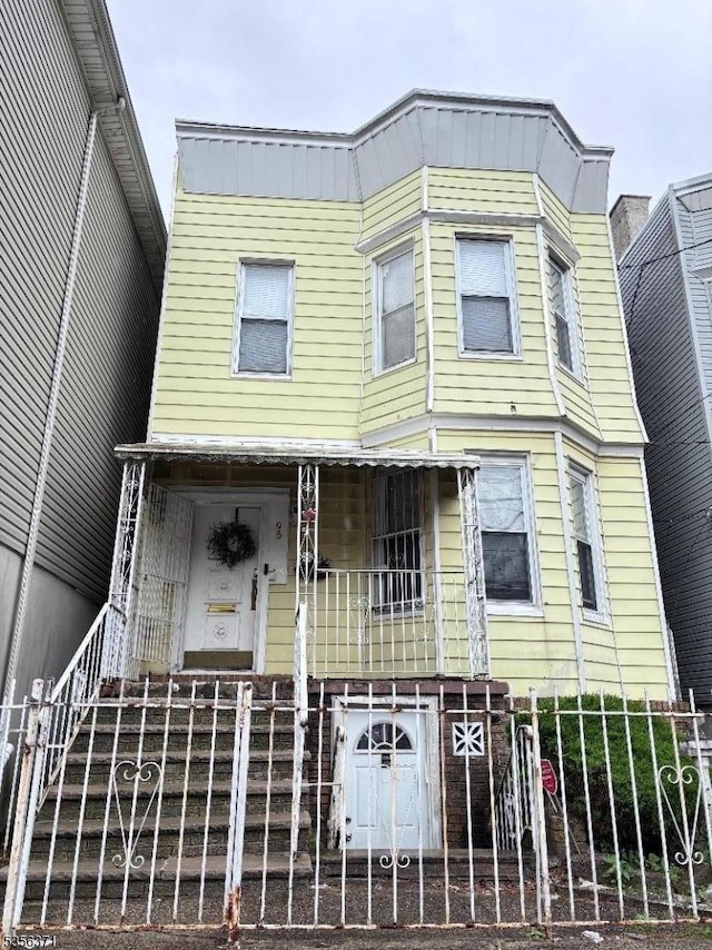 95 Bidwell Ave, Jersey City, NJ 07305 - view of front of house featuring covered porch