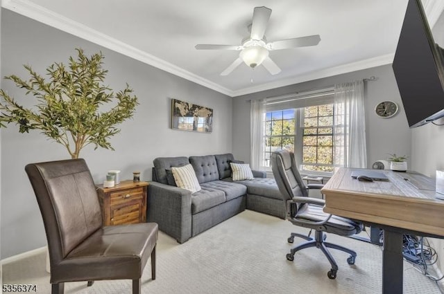 office area featuring crown molding, carpet floors, and a ceiling fan