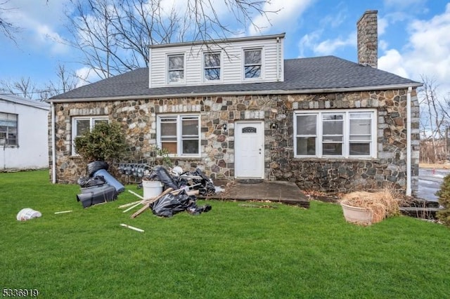 797 Passaic Ave, West Caldwell Twp, NJ 07006 - view of front of house with stone siding, a front lawn, a chimney, and a shingled roof