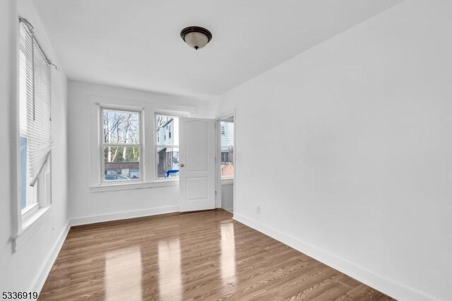 797 Passaic Ave, West Caldwell Twp, NJ 07006 - spare room with wood finished floors and baseboards