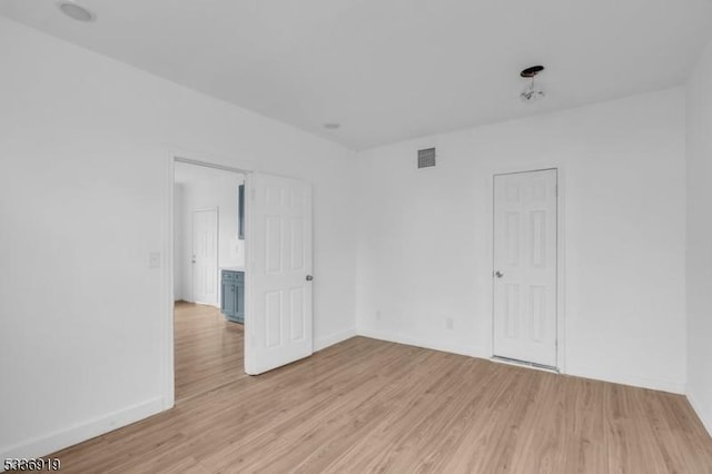 797 Passaic Ave, West Caldwell Twp, NJ 07006 - spare room with light wood-type flooring and baseboards