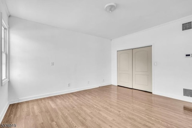 797 Passaic Ave, West Caldwell Twp, NJ 07006 - unfurnished bedroom featuring light wood-type flooring, baseboards, and a closet