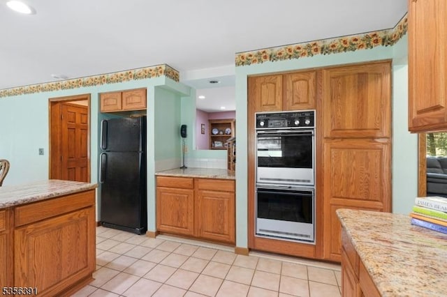 75 Wolfs Corner Rd, Green Twp, NJ 07860 - kitchen featuring freestanding refrigerator, multiple ovens, light tile patterned floors, light stone counters, and recessed lighting