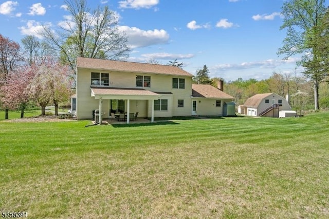 75 Wolfs Corner Rd, Green Twp, NJ 07860 - back of property featuring a chimney, a yard, and a patio
