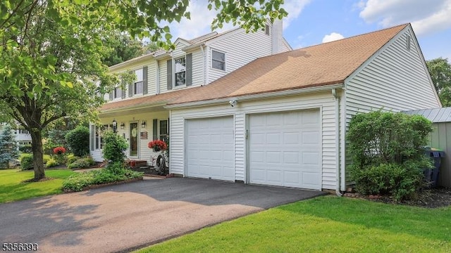 12 Fox Chase Run, Hillsborough Twp, NJ 08844 - traditional home featuring asphalt driveway, a chimney, an attached garage, and a front yard