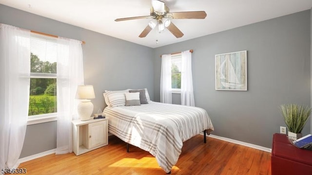 12 Fox Chase Run, Hillsborough Twp, NJ 08844 - bedroom with light wood-style flooring, baseboards, and ceiling fan