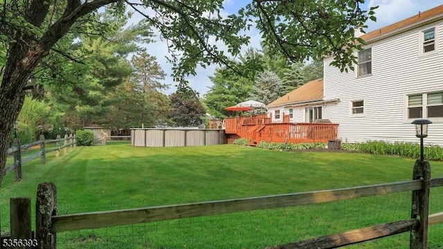 12 Fox Chase Run, Hillsborough Twp, NJ 08844 - view of yard with a deck and a pool