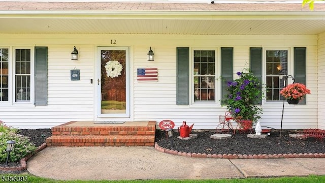 12 Fox Chase Run, Hillsborough Twp, NJ 08844 - doorway to property with a porch