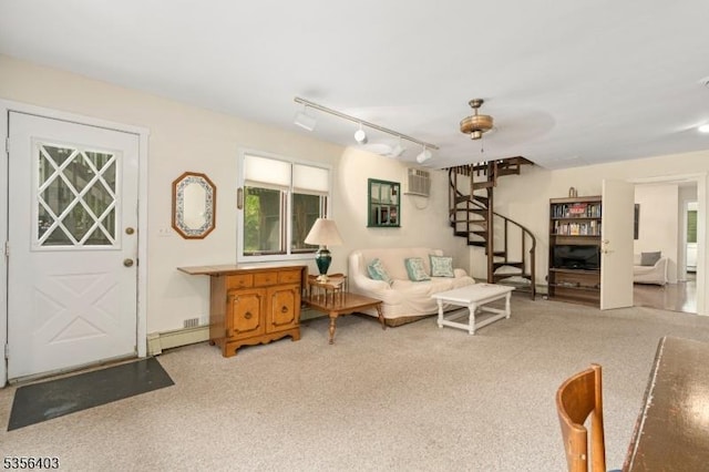 87 Ivy Ln, Bridgewater Twp, NJ 08807 - living room with ceiling fan, stairway, an AC wall unit, and healthy amount of natural light