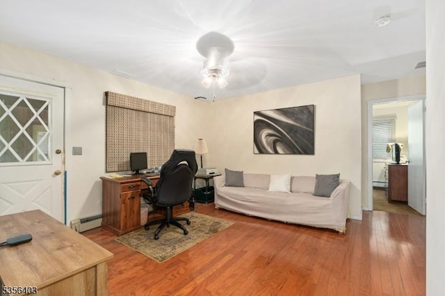 87 Ivy Ln, Bridgewater Twp, NJ 08807 - office featuring baseboard heating, wood finished floors, and ceiling fan