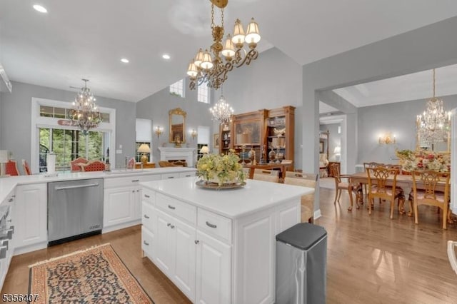 16 Gordon Way, Mount Olive Twp, NJ 07836 - kitchen featuring a chandelier, dishwasher, light countertops, a center island, and white cabinetry