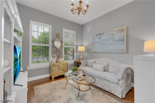 16 Gordon Way, Mount Olive Twp, NJ 07836 - living room featuring a chandelier and wood finished floors