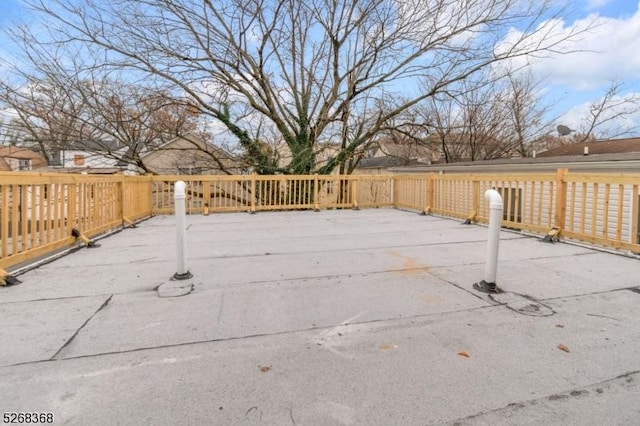 wooden terrace featuring a patio