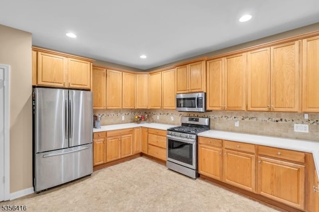 1111 Conrad Way, Franklin Twp, NJ 08873 - kitchen with stainless steel appliances, light countertops, tasteful backsplash, recessed lighting, and light brown cabinets