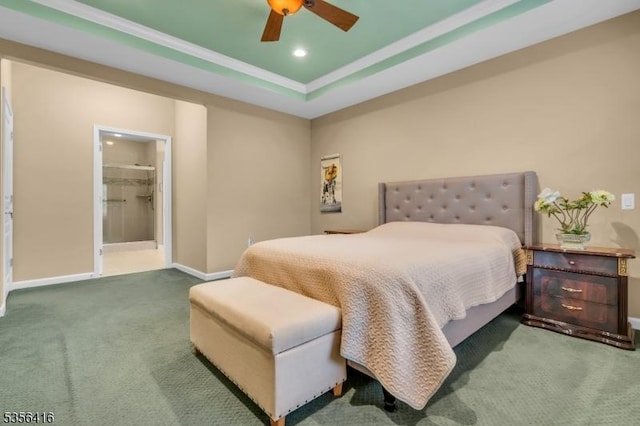 1111 Conrad Way, Franklin Twp, NJ 08873 - carpeted bedroom with baseboards, a tray ceiling, ceiling fan, ensuite bath, and crown molding