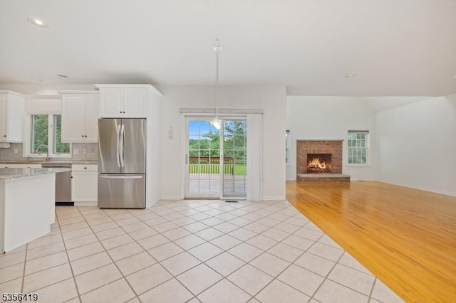 1 Joss Way, Long Hill Twp, NJ 07946 - kitchen featuring stainless steel appliances, light tile patterned floors, healthy amount of natural light, decorative backsplash, and recessed lighting