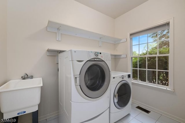 1 Joss Way, Long Hill Twp, NJ 07946 - washroom with separate washer and dryer and light tile patterned floors