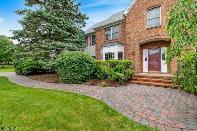 1 Joss Way, Long Hill Twp, NJ 07946 - doorway to property featuring brick siding and a lawn