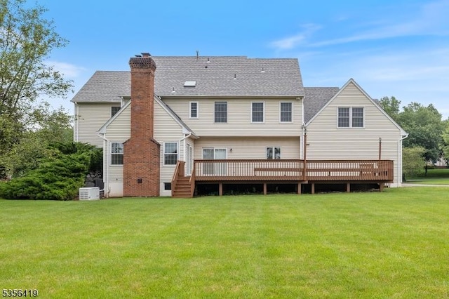 1 Joss Way, Long Hill Twp, NJ 07946 - rear view of property featuring a wooden deck, a lawn, a chimney, and roof with shingles
