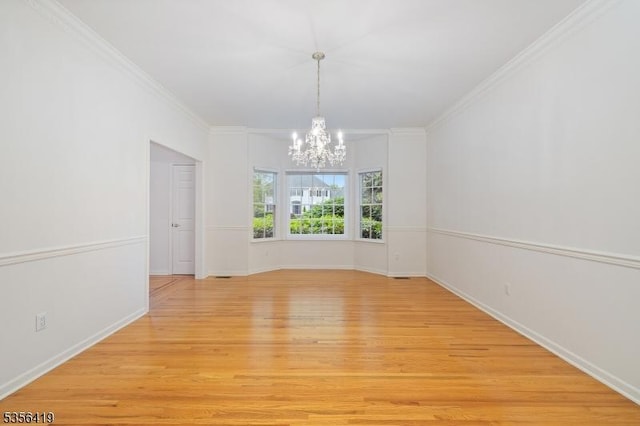 1 Joss Way, Long Hill Twp, NJ 07946 - empty room with a chandelier, light wood-style floors, and ornamental molding