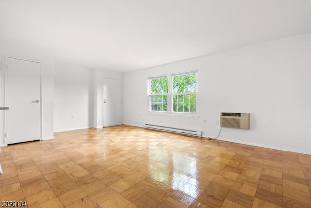 74 E Maple St, Teaneck Twp, NJ 07666 - unfurnished room featuring baseboard heating and an AC wall unit