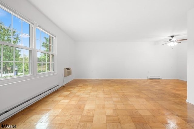 74 E Maple St, Teaneck Twp, NJ 07666 - spare room with a baseboard heating unit, baseboard heating, ceiling fan, and a wall unit AC