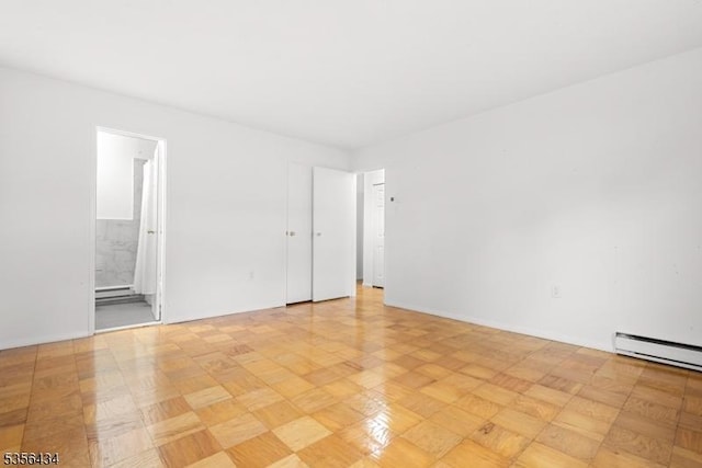 74 E Maple St, Teaneck Twp, NJ 07666 - spare room with baseboards and a baseboard heating unit