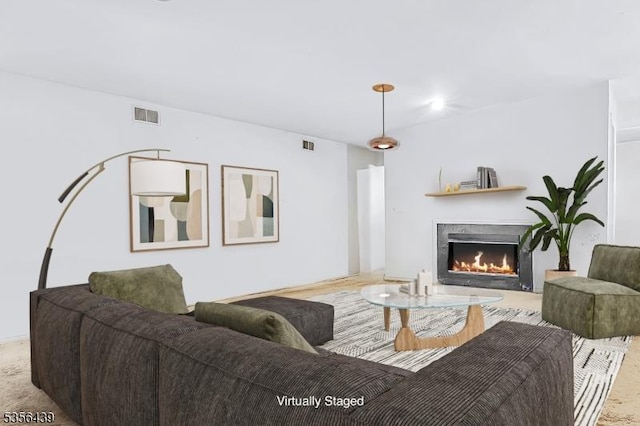18 Paris Cir Unit 18, West Orange Twp, NJ 07052 - living room featuring a lit fireplace