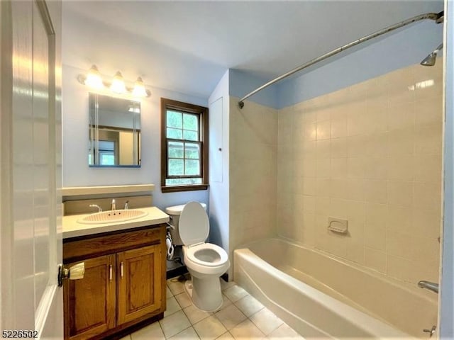 bathroom featuring tile patterned floors, shower / tub combination, toilet, and vanity