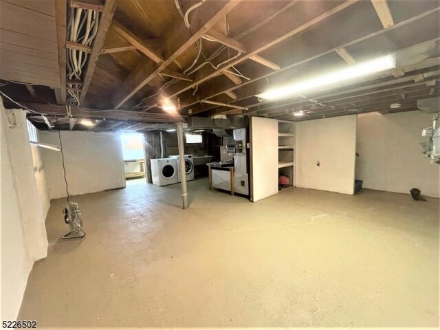 below grade area with separate washer and dryer