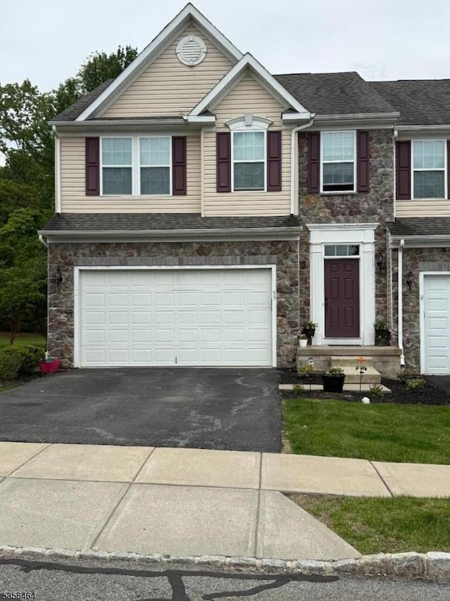 53 Washington Square Cir, Washington Boro, NJ 07882 - view of front facade featuring stone siding, asphalt driveway, an attached garage, and roof with shingles