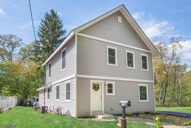 view of front of home with central AC unit